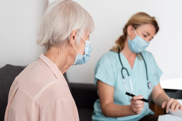 female nurse elder woman nursing home check up 23 2148757712