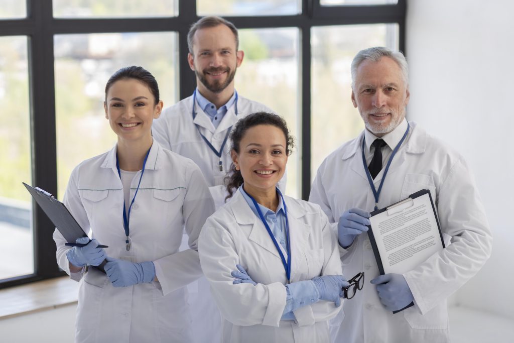 medium shot scientists posing together